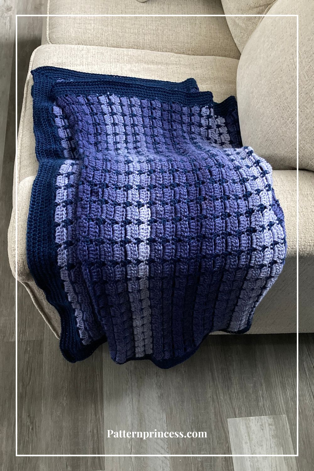 Boxed Block Stitch Blanket Folded on Sofa