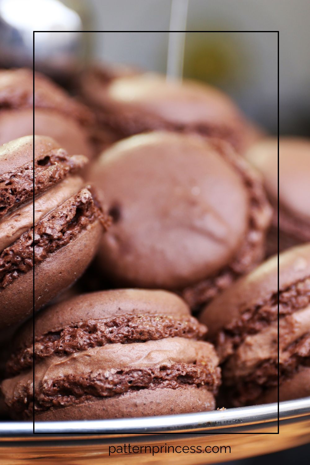 Plate full of decadent chocolate macarons